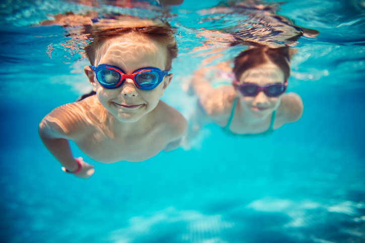 children swimming underwater